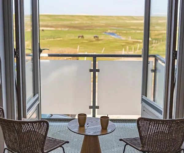 ホテル Strandhotel Camperduin スコールル